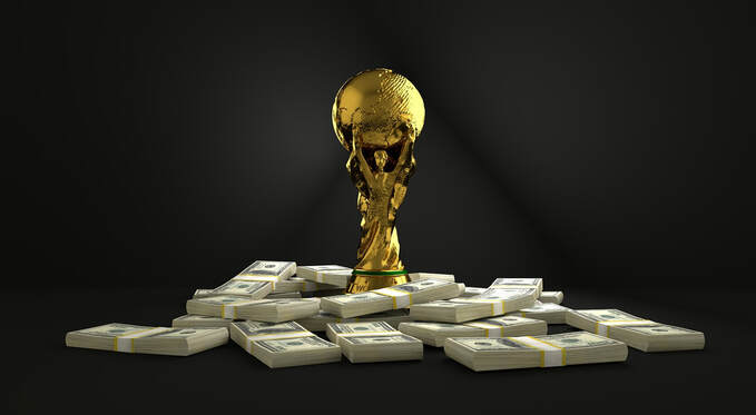 trophy sitting on pile of money