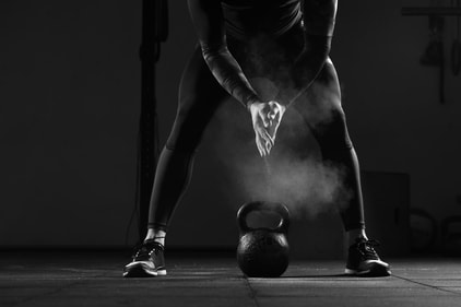 Man getting ready to lift kettlebell